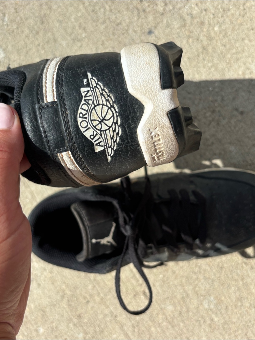 Air Jordan Black and White Retro cleats